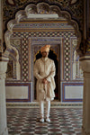 MUSHROOM RAW SILK SHERWANI WITH A COTTON SILK KURTA AND CHURIDAR