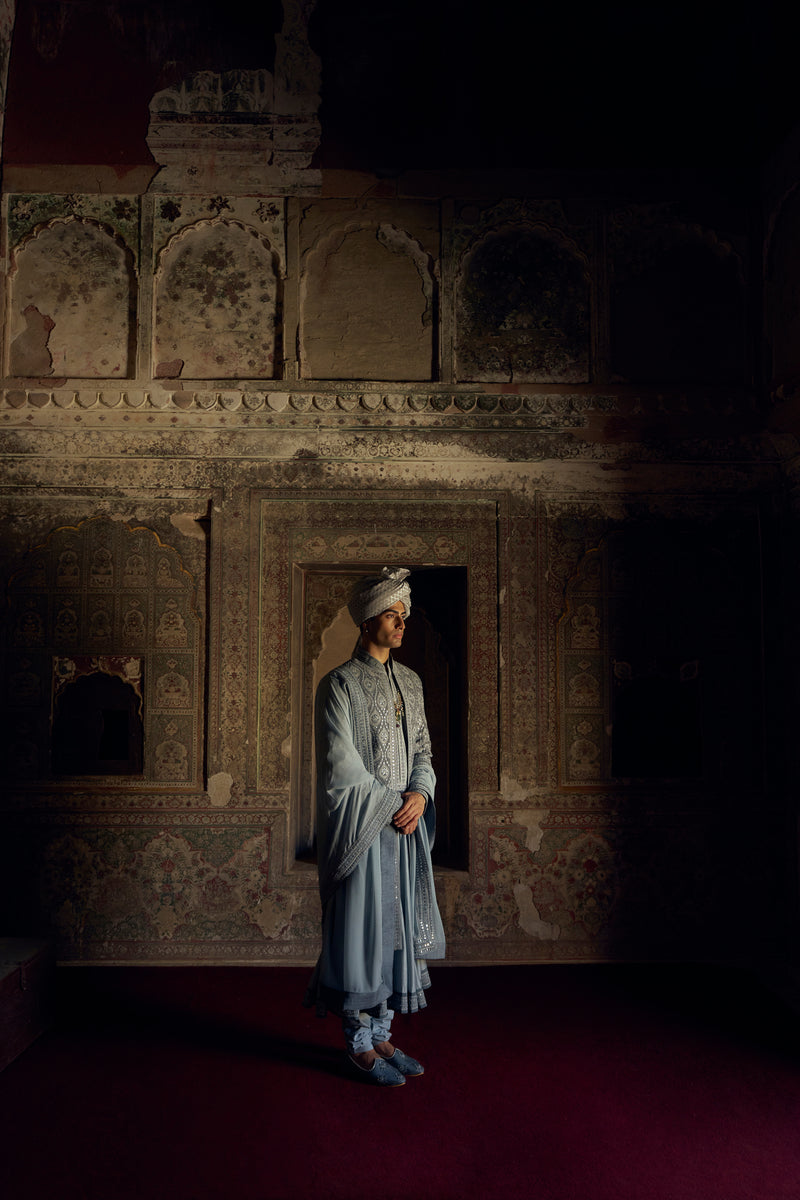 GREY RAW SILK OPEN SHERWANI WITH A CHOGA AND CHURIDAR