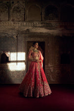 RED TO CORAL OMBRE DYED RAW SILK LEHENGA WITH A CORAL CHOLI