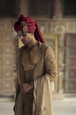 GOLD MATKA SILK ANGRAKHA STYLE SHERWANI WITH A CHANDERI BOOTI CHOGA AND CHURIDAR