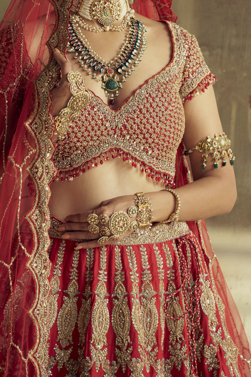 RED RAW SILK LEHENGA CHOLI SET WITH A HEAVY NET DUPATTA