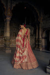 RED RAW SILK LEHENGA CHOLI WITH A NET DUPATTA