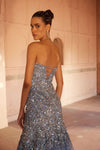 An off shoulder net soft blue gown