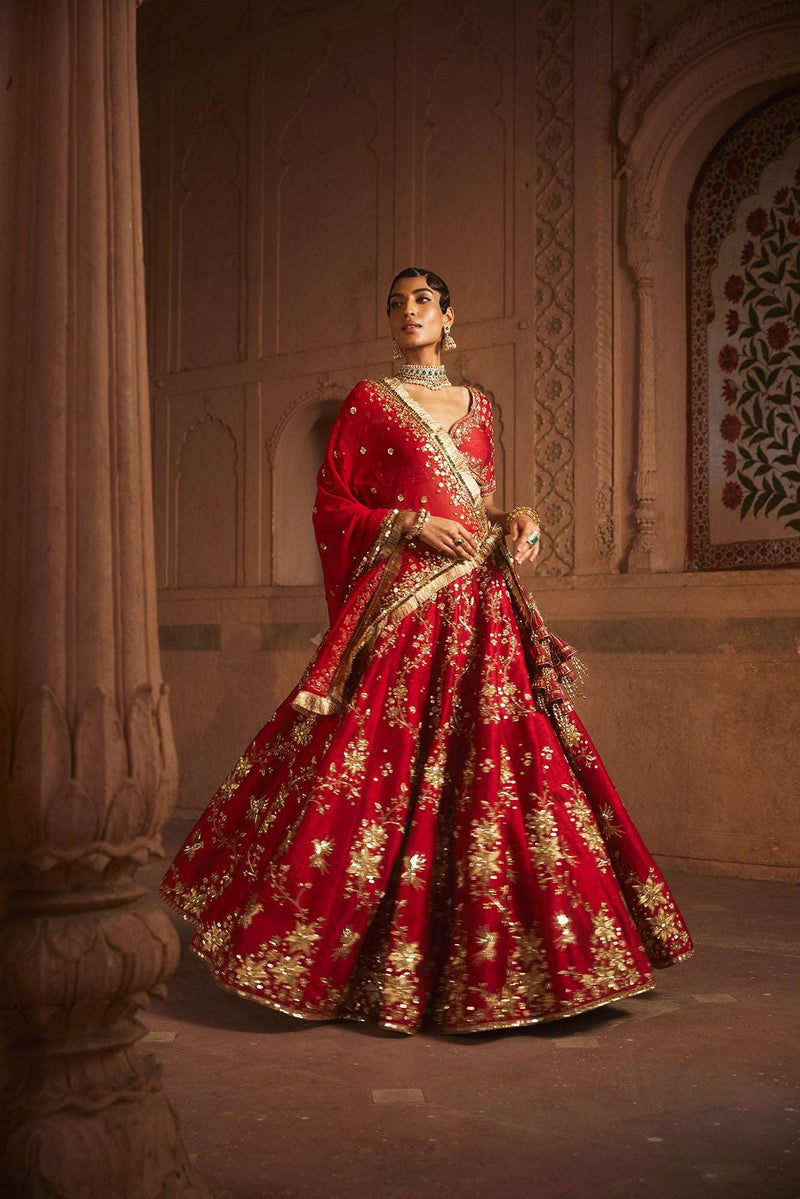 A Red  raw silk lehenga with Georgette Duptta