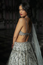 White Chandelier Lehenga Set by Seema Gujral at Lotus Bloom