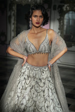 White Chandelier Lehenga Set by Seema Gujral at Lotus Bloom