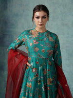 A Green Cotton Silk Anarkali Gown With Attached Cotton Slip And Organza Dupatta