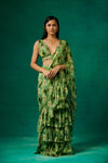 Green floral print drape saree with ruffles and plunge V neck blouse