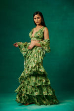 Green floral print drape saree with ruffles and plunge V neck blouse