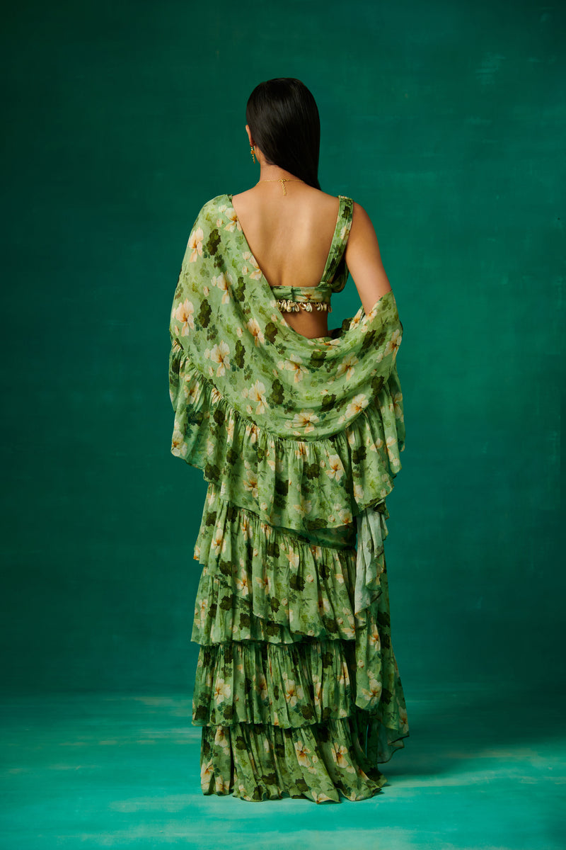 Green floral print drape saree with ruffles and plunge V neck blouse