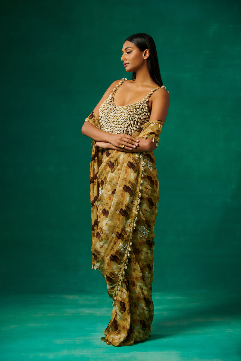 Shells embellished blouse and drape saree