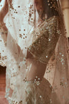 CREAM LEHENGA WITH GREEN HIGHLIGHTING