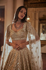 CREAM LEHENGA WITH GREEN HIGHLIGHTING