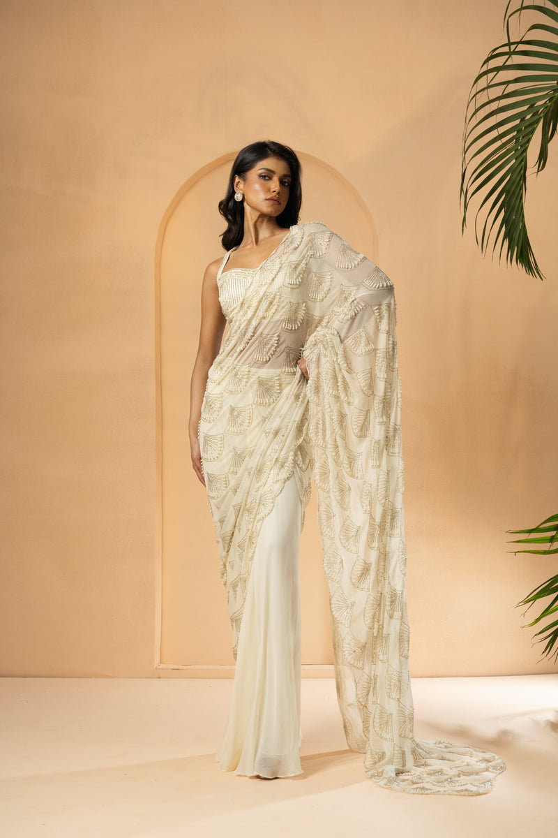 Ivory embroidered pre-stitched drape saree