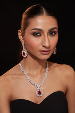 Rhodium Plated Zircon Studded With Red Synthetic Stone Pendant Necklace & Drop Earrings Set