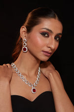 Rhodium Plated Zircon Studded With Red Synthetic Stone Pendant Necklace & Drop Earrings Set