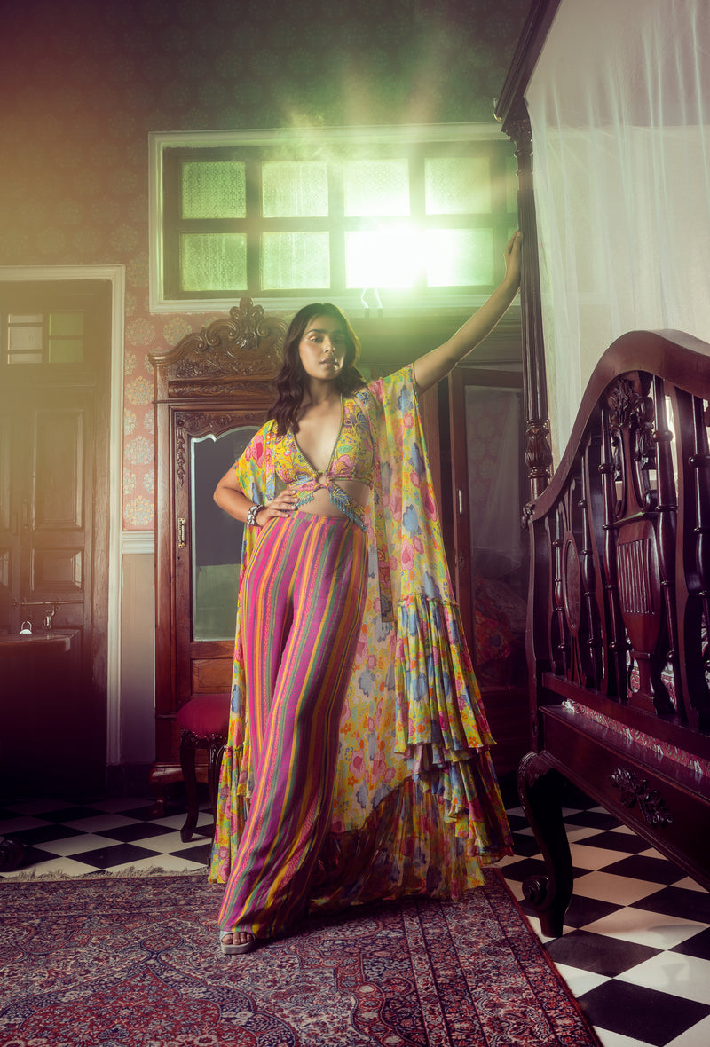 YELLOW FLORAL CROP TOP WITH PINK STRIPE PRINTED PANTS AND YELLOW FLORAL SHORT-LONG CAPENG CAPE WITH TRIANGLE BAG