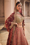 RUST TAFETTA LEHENGA WITH OLIVE CHOLI, MAROON TISSUE DUPATTA AND BELT