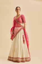 IVORY BANARSI BOOTI LEHENGA WITH FUSCHIA CHOLI AND DUPATTA