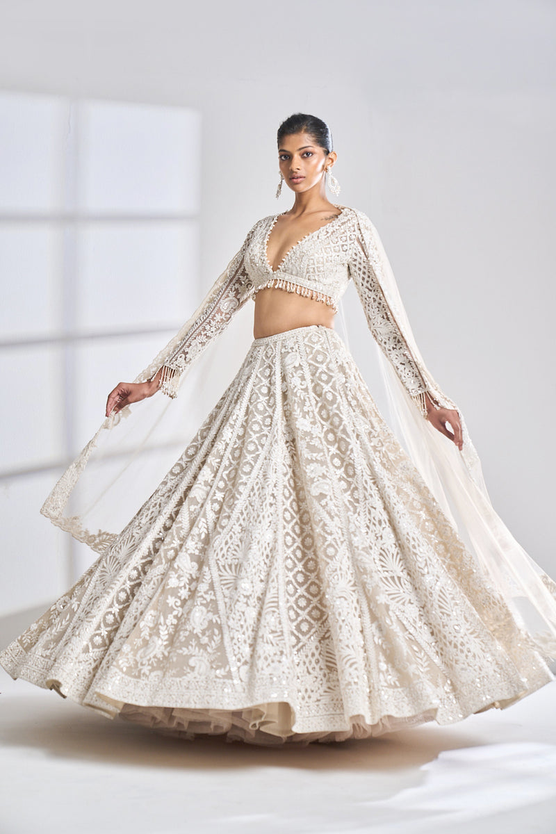 Nude cream abstract lehenga by Seema Gujral - Lotus Bloom Canada