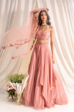 CREPE SCOOP NECK FLORAL BORDER BUSTIER WITH DRAPES PANELLED LEHENGA & TULLE FLORAL EMBROIDERED DUPATTA