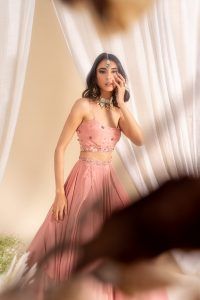 CREPE SCOOP NECK FLORAL BORDER BUSTIER WITH DRAPES PANELLED LEHENGA & TULLE FLORAL EMBROIDERED DUPATTA