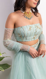 OFF-SHOULDER EMBROIDERED BLOUSE WITH PEARL TASSELED LEHENGA AND DUPATTA