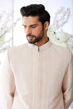 Salmon Short Sherwani Set by Seema Gujral at Lotus Bloom Canada. 