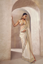 Sunehri Tissue silk saree with multicolored blouse