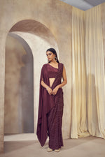 Sitaara wine saree with asymmetrical cape blouse