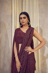 Sitaara wine saree with asymmetrical cape blouse