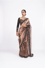 Deep green copper tissue saree set