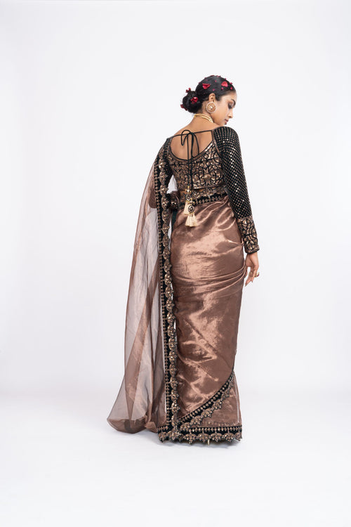 Deep green copper tissue saree set