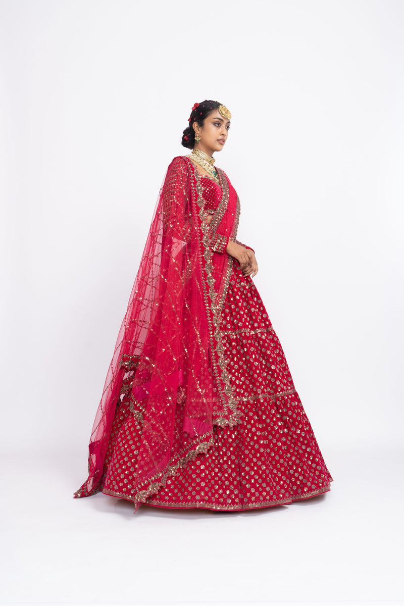 Red floral lehnga with sweetheart neck blouse and 2 embroidered dupattas.