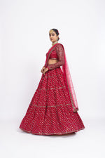 Red floral lehnga with sweetheart neck blouse and 2 embroidered dupattas.